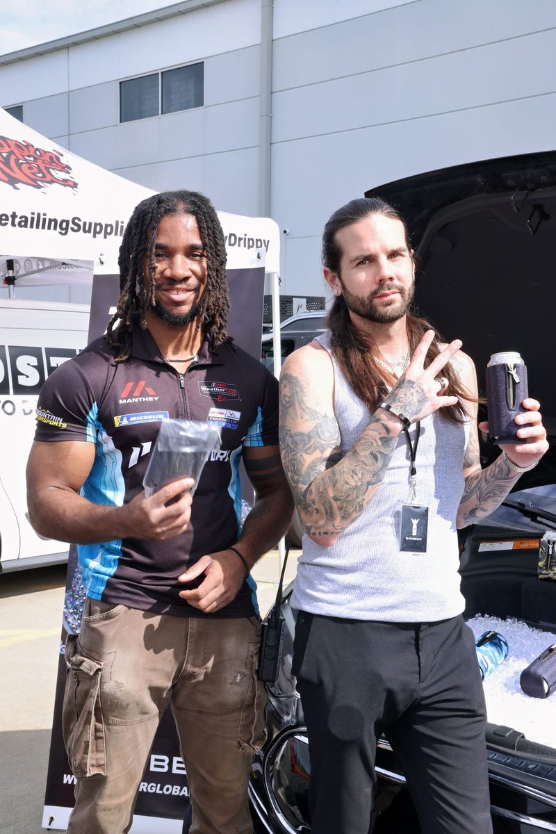 Guests with Phorm Energy drinks at the Cars n Coffee event